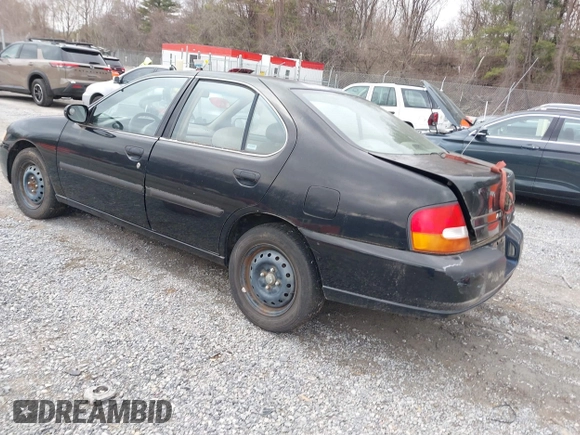 1999 Nissan Altima XE with VIN 1N4DL01DXXC148729, listed as a IAAI auction lot 41697641 with 187,596 mi miles. Bid and sale history available at carsss.com. Image 3.