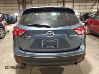 2016 Mazda CX-5 Sport with VIN JM3KE4BY9G0786547, listed as a Copart auction lot 60169155 with 151,599 mi miles and Clean title. Bid and sale history available at DreamBid. Image 6.