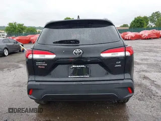 2022 Toyota Corolla Cross LE with VIN 7MUCAABG8NV004527, listed as a IAAI auction lot 42259519 with 15,211 mi miles and . Bid and sale history available at DreamBid. Image 15.