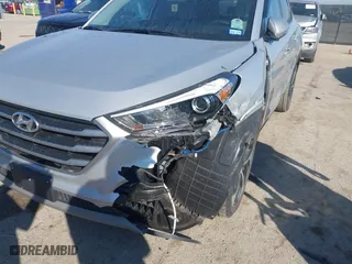 2017 Hyundai Tucson Value with VIN KM8J33A22HU457809, listed as a IAAI auction lot 41632652 with 26,154 mi miles. Bid and sale history available at carsss.com. Image 6.
