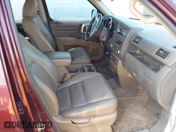 2007 Honda Ridgeline RTL with VIN 2HJYK16587H518901, listed as a IAAI auction lot 42762425 with 206,243 mi miles and . Bid and sale history available at DreamBid. Image 5.