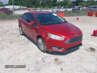2018 Ford Focus Titanium z VIN 1FADP3J23JL295888, wystawiony jako IAAI lot #42524088 z przebiegiem 108 812 mil mil oraz . Historia ofert i sprzedaży dostępna na DreamBid. Obrazek 1.