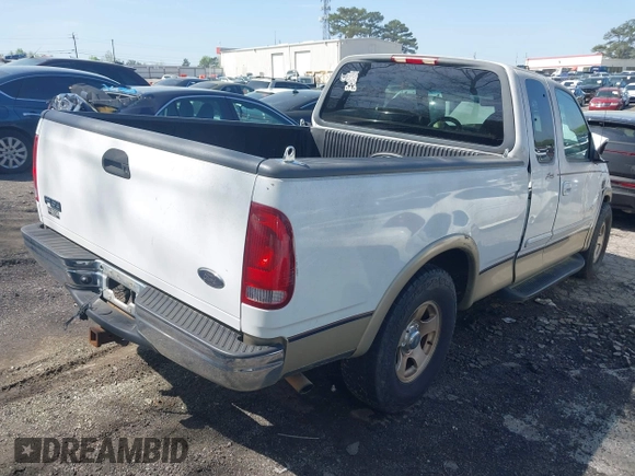 1999 Ford F-150 XL with VIN 2FTRX17L6XCB21286, listed as a IAAI auction lot 41891244 with Not provided miles and . Bid and sale history available at DreamBid. Image 4.