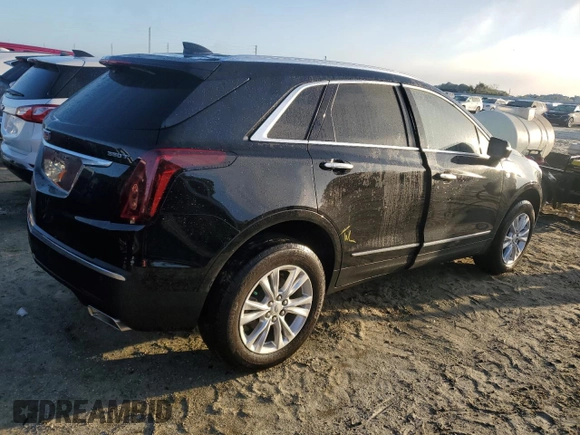 2022 Cadillac XT5 FWD Luxury z VIN 1GYKNAR49NZ159814, wystawiony jako Copart lot #74506584 z przebiegiem 7 069 mil mil oraz Nie do naprawy • Non repairable. Historia ofert i sprzedaży dostępna na DreamBid. Obrazek 3.