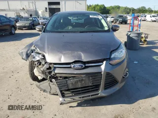 2014 Ford Focus Titanium with VIN 1FADP3N24EL269008, listed as a Copart auction lot 56396975 with 116,856 mi miles and Salvage title. Bid and sale history available at DreamBid. Image 5.
