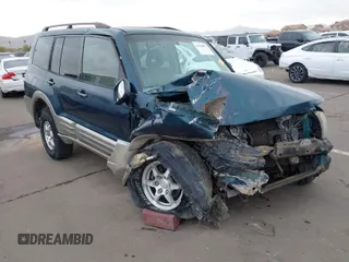 2002 Mitsubishi Montero Limited z VIN JA4MW51RX2J040586, wystawiony jako IAAI lot #41566077 z przebiegiem 149 851 mil mil oraz . Historia ofert i sprzedaży dostępna na DreamBid. Obrazek 1.
