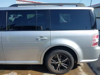 2013 Ford Flex SE z VIN 2FMGK5B88DBD11247, wystawiony jako IAAI lot #41979831 z przebiegiem 102 211 mil mil oraz . Historia ofert i sprzedaży dostępna na DreamBid. Obrazek 19.