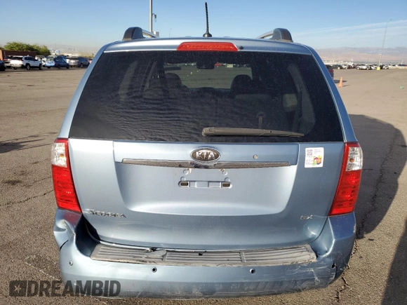 2009 Kia Sedona EX with VIN KNDMB233196275030, listed as a Copart auction lot 71997154 with 96,777 mi miles and Salvage Title. Bid and sale history available at carsss.com. Image 6.