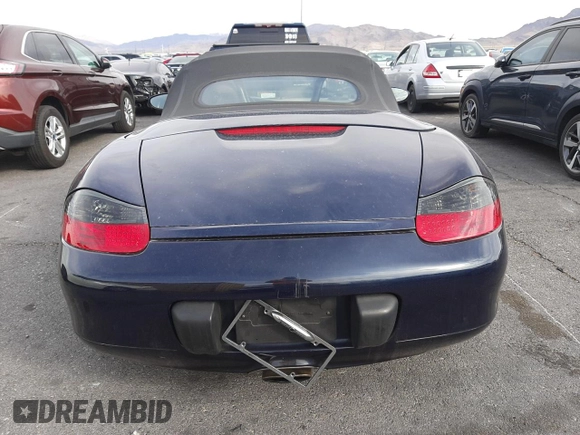 2000 Porsche Boxster z VIN WP0CA2981YU626756, wystawiony jako Copart lot #51706035 z przebiegiem 117 369 mil mil oraz Czysty tytuł • Clean title. Historia ofert i sprzedaży dostępna na DreamBid. Obrazek 6.