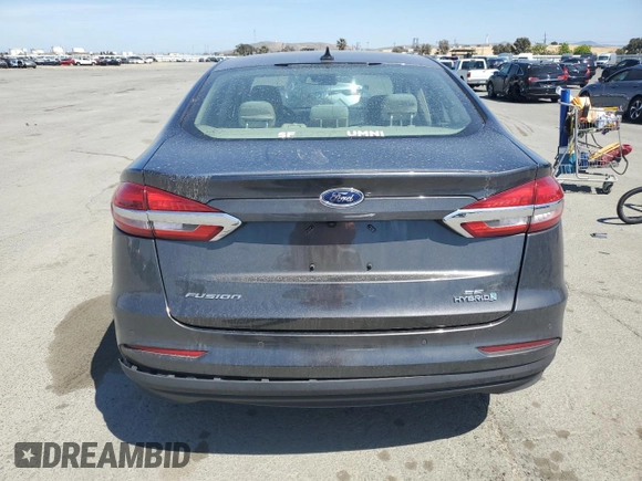 2020 Ford Fusion SE z VIN 3FA6P0LU0LR190090, wystawiony jako Copart lot #54791445 z przebiegiem 166 563 mil mil oraz Szkoda całkowita • Salvage title. Historia ofert i sprzedaży dostępna na DreamBid. Obrazek 6.