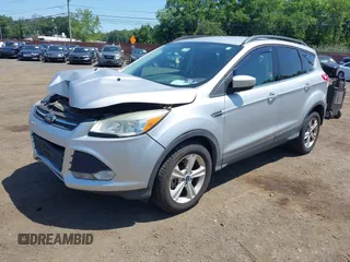 2014 Ford Escape SE with VIN 1FMCU9GX8EUA88526, listed as a IAAI auction lot 42578612 with 22,623 mi miles and . Bid and sale history available at DreamBid. Image 2.