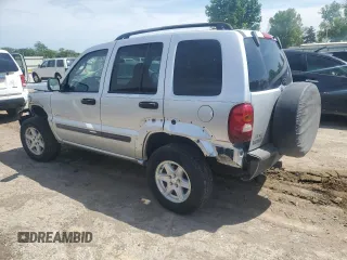 2003 Jeep Liberty Sport z VIN 1J4GK48K43W657028, wystawiony jako Copart lot #55070315 z przebiegiem 243 019 mil mil oraz Szkody całkowita. Historia ofert i sprzedaży dostępna na DreamBid. Obrazek 2.