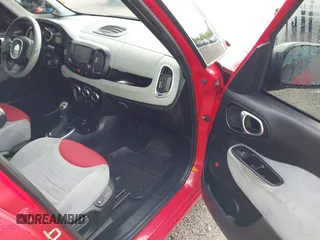 2014 FIAT 500L Easy z VIN ZFBCFABH7EZ001401, wystawiony jako IAAI lot #42244522 z przebiegiem 164 138 mil mil oraz . Historia ofert i sprzedaży dostępna na DreamBid. Obrazek 5.
