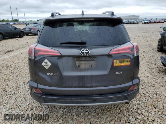 2017 Toyota RAV4 XLE with VIN JTMWFREV9HJ103246, listed as a Copart auction lot 52048655 with 0 mi miles and Salvage Title. Bid and sale history available at carsss.com. Image 6.