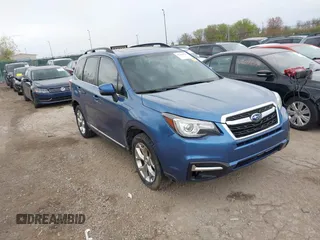2017 Subaru Forester Touring with VIN JF2SJAWC4HH803275, listed as a IAAI auction lot 42109087 with 114,532 mi miles and . Bid and sale history available at DreamBid. Image 1.