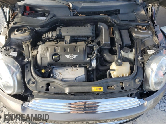 2011 MINI Convertible with VIN WMWZN3C53BT133576, listed as a Copart auction lot 87543835 with 69,999 mi miles and Salvage title. Bid and sale history available at DreamBid. Image 11.