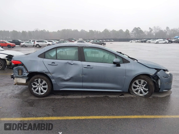2021 Toyota Corolla LE with VIN 5YFEPMAE8MP242968, listed as a IAAI auction lot 41620339 with 56,752 mi miles and . Bid and sale history available at DreamBid. Image 13.