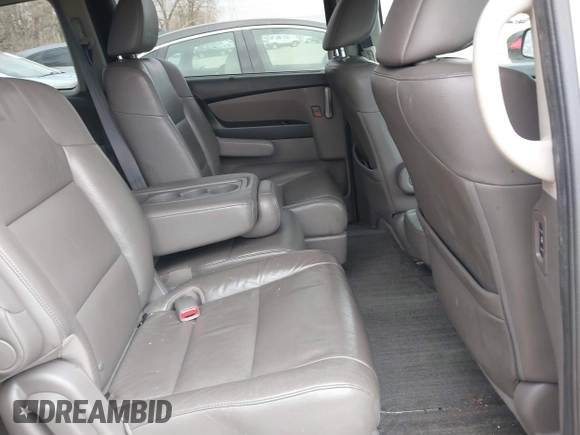2012 Honda Odyssey EX-L with VIN 5FNRL5H60CB081866, listed as a IAAI auction lot 41835701 with 151,236 mi miles and . Bid and sale history available at DreamBid. Image 8.