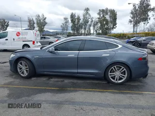 2013 Tesla Model S with VIN 5YJSA1CN8DFP21869, listed as a IAAI auction lot 41772603 with Not provided miles and . Bid and sale history available at DreamBid. Image 13.