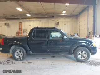 2005 Ford Explorer Sport Trac XLS with VIN 1FMZU77K45UB32573, listed as a IAAI auction lot 41760637 with 216,186 mi miles. Bid and sale history available at carsss.com. Image 13.
