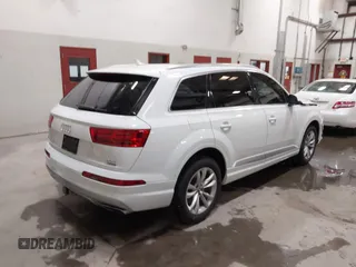 2018 Audi Q7 Premium Plus with VIN WA1LAAF73JD028903, listed as a IAAI auction lot 42044235 with 113,033 mi miles and . Bid and sale history available at DreamBid. Image 4.