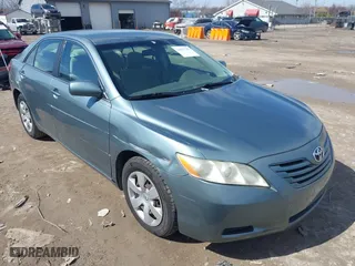 2007 Toyota Camry CE with VIN 4T1BE46K77U608106, listed as a IAAI auction lot 41827287 with 164,223 mi miles. Bid and sale history available at carsss.com. Image 1.
