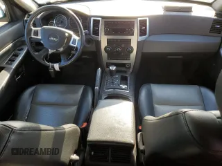 2009 Jeep Grand Cherokee Laredo with VIN 1J8HR48P39C559192, listed as a Copart auction lot 74007094 with 105,997 mi miles and Salvage Title. Bid and sale history available at carsss.com. Image 8.