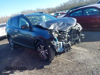 2016 Toyota RAV4 LE with VIN JTMBFREV9GJ071041, listed as a IAAI auction lot 41410462 with 57,396 mi miles. Bid and sale history available at carsss.com. Image 1.