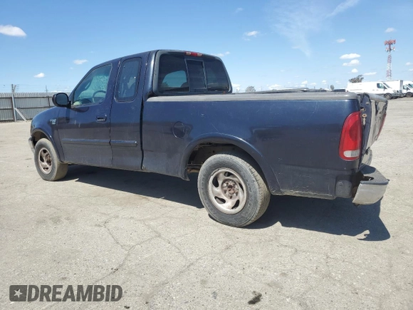 2000 Ford F-150 XL with VIN 1FTRX17L0YKA29295, listed as a Copart auction lot 50719525 with 0 mi miles and Salvage Title. Bid and sale history available at carsss.com. Image 2.