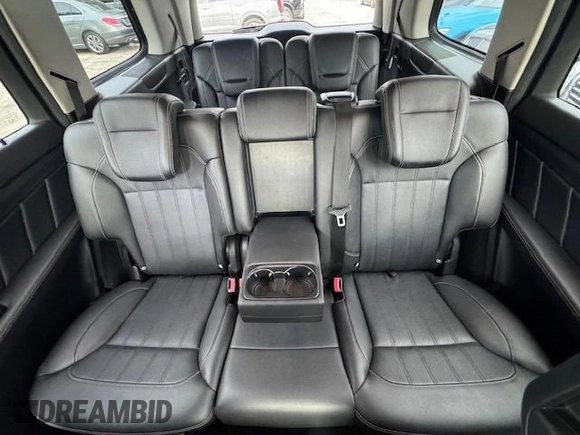 2016 Mercedes-Benz GL with VIN 4JGDF6EE1GA625384, listed as a Copart auction lot 77045634 with 104,938 mi miles and Salvage Title. Bid and sale history available at carsss.com. Image 9.