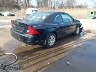 2003 Honda Civic EX with VIN 1HGEM22973L024883, listed as a IAAI auction lot 41536461 with 219,927 mi miles. Bid and sale history available at carsss.com. Image 4.