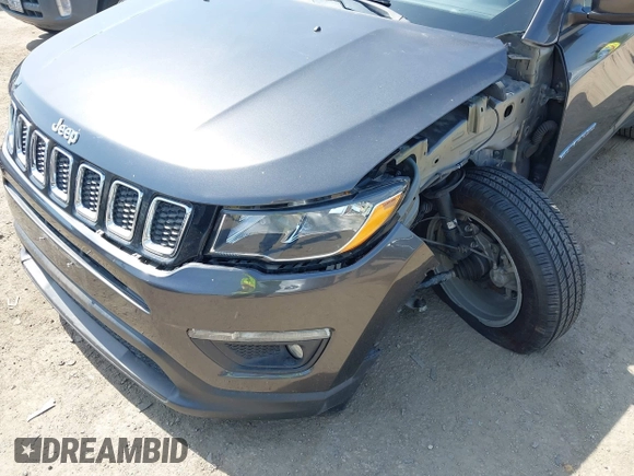2019 Jeep Compass Latitude with VIN 3C4NJDBB8KT729491, listed as a IAAI auction lot 42489691 with 73,022 mi miles and . Bid and sale history available at DreamBid. Image 6.