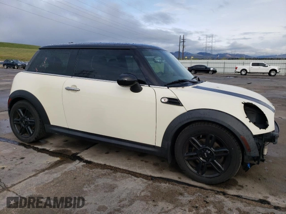 2012 MINI Hardtop with VIN WMWSU3C51CT186184, listed as a Copart auction lot 55090935 with 100,669 mi miles and Salvage Title. Bid and sale history available at DreamBid. Image 4.