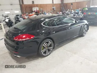 2016 Porsche Panamera S E-Hybrid z VIN WP0AD2A74GL040039, wystawiony jako IAAI lot #42411042 z przebiegiem 60 616 mil mil oraz . Historia ofert i sprzedaży dostępna na DreamBid. Obrazek 4.
