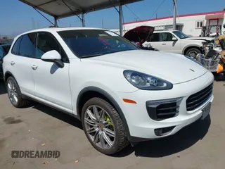 2016 Porsche Cayenne S E-Hybrid z VIN WP1AE2A25GLA63734, wystawiony jako IAAI lot #42549379 z przebiegiem 155 065 mil mil oraz . Historia ofert i sprzedaży dostępna na DreamBid. Obrazek 1.