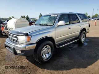 2000 Toyota 4Runner SR5 z VIN JT3HN86R5Y0270799, wystawiony jako Copart lot #61671675 z przebiegiem 255 023 mil mil oraz Szkoda całkowita • Salvage title. Historia ofert i sprzedaży dostępna na DreamBid. Obrazek 1.