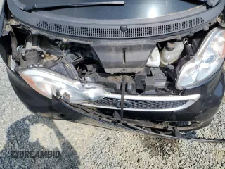 2013 Smart fortwo Pure with VIN WMEEJ3BA9DK670264, listed as a Copart auction lot 52817215 with 51,434 mi miles and Salvage Title. Bid and sale history available at DreamBid. Image 12.