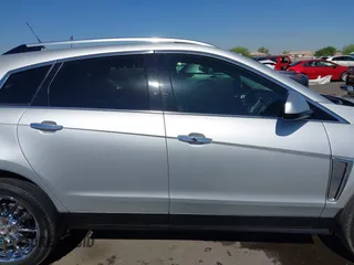 2013 Cadillac SRX Premium Collection z VIN 3GYFNEE36DS556446, wystawiony jako IAAI lot #42289824 z przebiegiem 23 988 mil mil oraz . Historia ofert i sprzedaży dostępna na DreamBid. Obrazek 14.