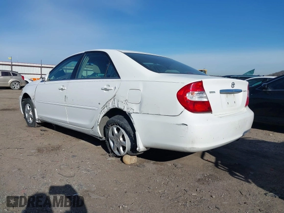 2003 Toyota Camry LE with VIN 4T1BE32K63U249910, listed as a IAAI auction lot 41719507 with 125,168 mi miles and . Bid and sale history available at DreamBid. Image 3.