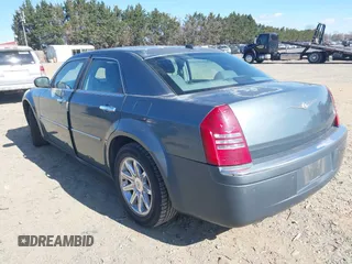 2005 Chrysler 300 with VIN 2C3AA63H45H502345, listed as a IAAI auction lot 41877543 with 96,541 mi miles. Bid and sale history available at carsss.com. Image 3.
