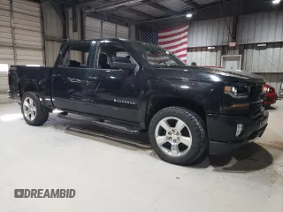 2016 Chevrolet Silverado 1500 LT with VIN 3GCUKREC3GG148667, listed as a Copart auction lot 49725285 with 40,330 mi miles and Salvage Title. Bid and sale history available at DreamBid. Image 4.