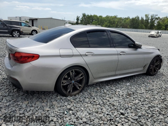 2019 BMW 5 Series M550i xDrive with VIN WBAJB9C53KB464902, listed as a Copart auction lot 54252875 with 45,157 mi miles and Salvage title. Bid and sale history available at DreamBid. Image 3.