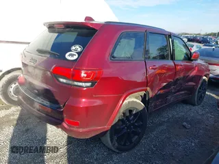 2018 Jeep Grand Cherokee Altitude with VIN 1C4RJEAG4JC238916, listed as a IAAI auction lot 41577887 with 103,038 mi miles. Bid and sale history available at carsss.com. Image 4.