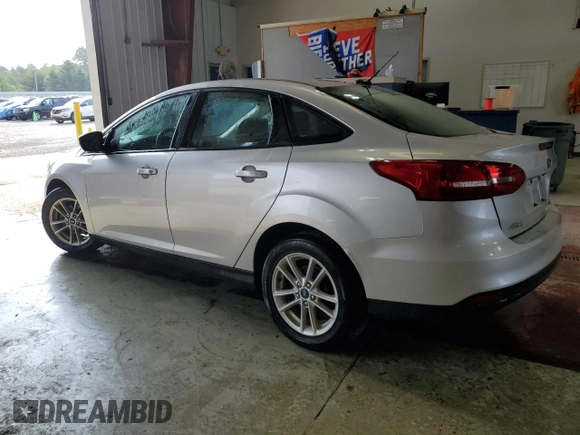 2018 Ford Focus SE with VIN 1FADP3F23JL214008, listed as a Copart auction lot 59692045 with 57,247 mi miles and Salvage title. Bid and sale history available at DreamBid. Image 2.