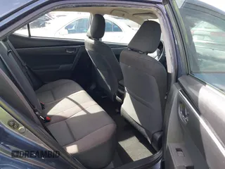 2018 Toyota Corolla L with VIN 5YFBURHEXJP806632, listed as a IAAI auction lot 41933984 with 70,091 mi miles and . Bid and sale history available at DreamBid. Image 8.