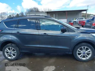 2017 Ford Escape SE with VIN 1FMCU9GDXHUA10453, listed as a IAAI auction lot 41860507 with 175,733 mi miles and . Bid and sale history available at DreamBid. Image 13.