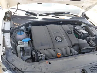 2012 Volkswagen Passat SE w/Sunroof with VIN 1VWBH7A39CC097668, listed as a IAAI auction lot 42100044 with 126,637 mi miles. Bid and sale history available at carsss.com. Image 10.