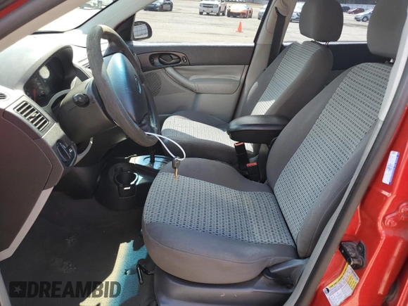 2007 Ford Focus S z VIN 1FAFP34NX7W360015, wystawiony jako Copart lot #57499655 z przebiegiem 237 516 mil mil oraz Szkoda całkowita • Salvage title. Historia ofert i sprzedaży dostępna na DreamBid. Obrazek 7.