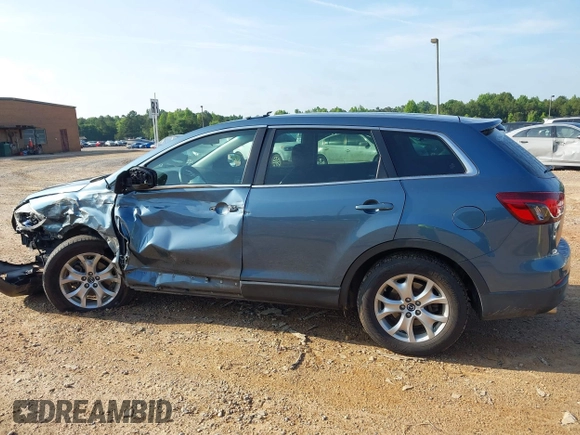 2014 Mazda CX-9 Touring with VIN JM3TB3CV7E0435659, listed as a IAAI auction lot 42428247 with 124,523 mi miles and . Bid and sale history available at DreamBid. Image 14.