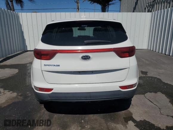 2018 Kia Sportage LX z VIN KNDPMCAC6J7302012, wystawiony jako Copart lot #53845725 z przebiegiem 89 349 mil mil oraz Czysty tytuł • Clean title. Historia ofert i sprzedaży dostępna na DreamBid. Obrazek 6.